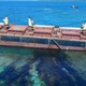 The “MV Solomon Trader” ship, which ran aground February 5, is leaking oil next to a UNESCO World Heritage site.